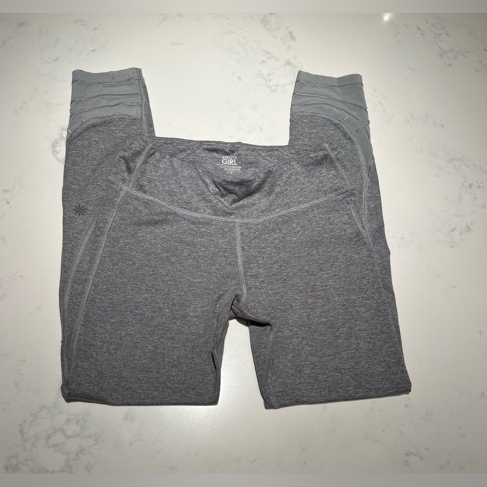 Athleta Size L youth grey with mesh bottom